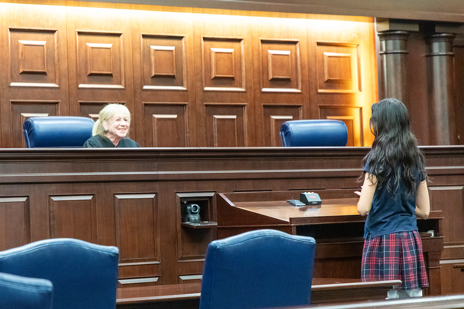 Student asking questions to a federal judge